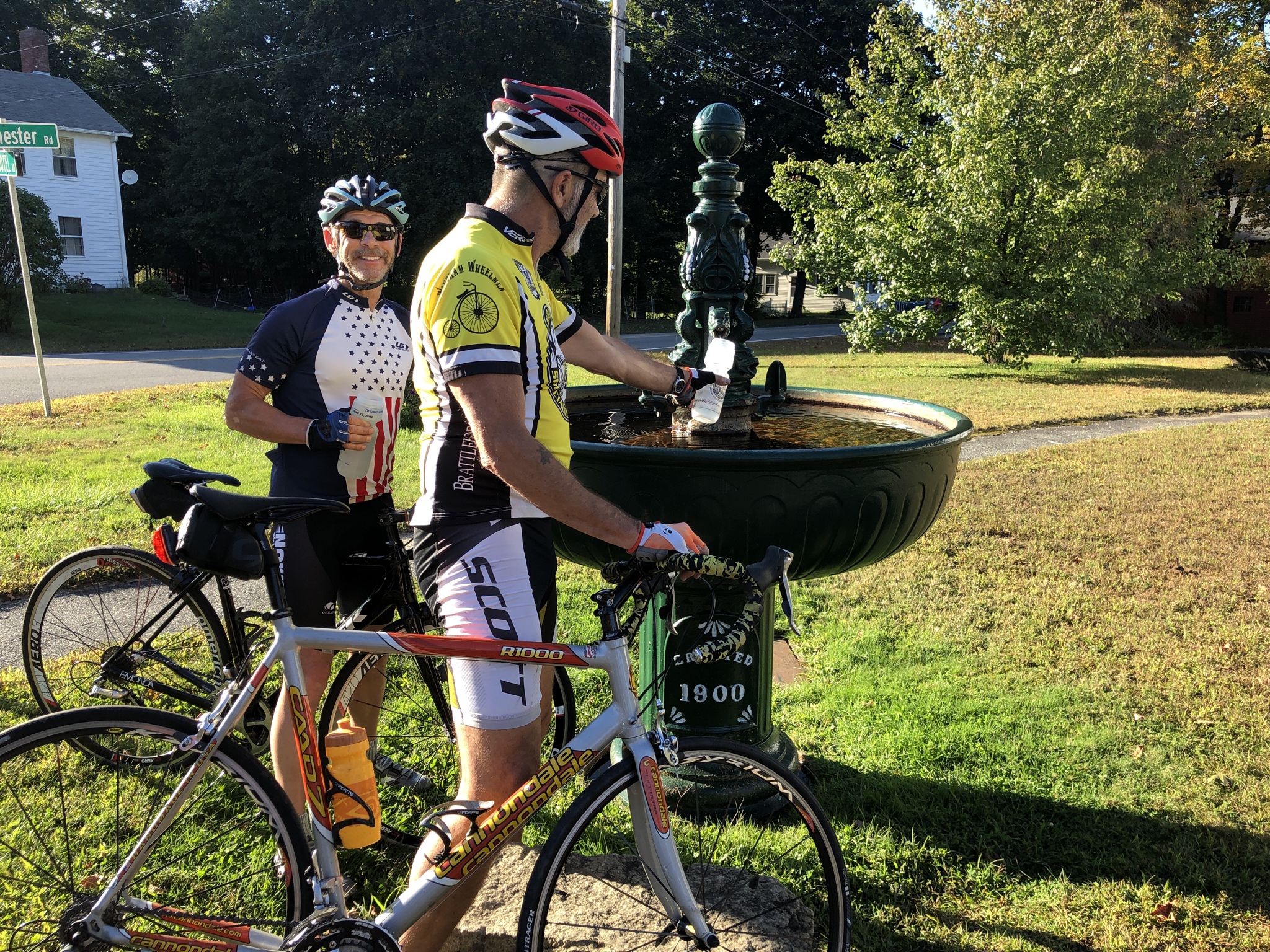 Cyclists filling their water bottles from Captain Ball's Fountain, 2019